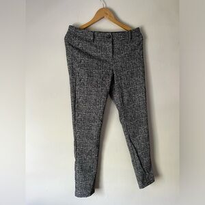 Medium size dress pants. Tag says “spandex”.Stretchy material. Short length